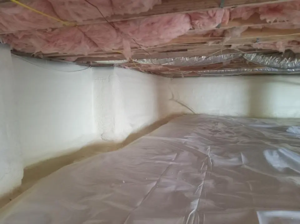 Crawl space encapsulation with closed-cell spray foam for Storm Damage Roof Repair in Holly Springs